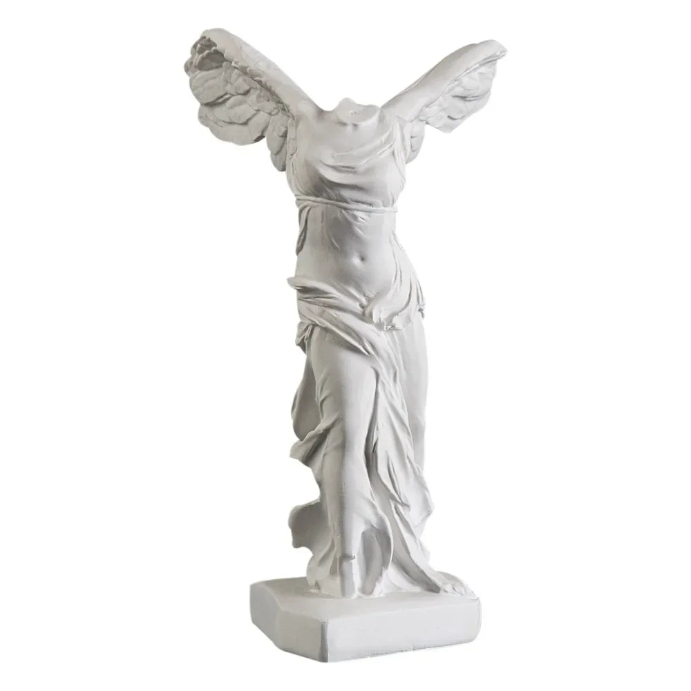 Timeless angel wing art statue for living room or cabinet.