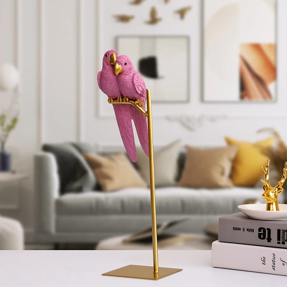 Handcrafted love bird statue on metallic stand.