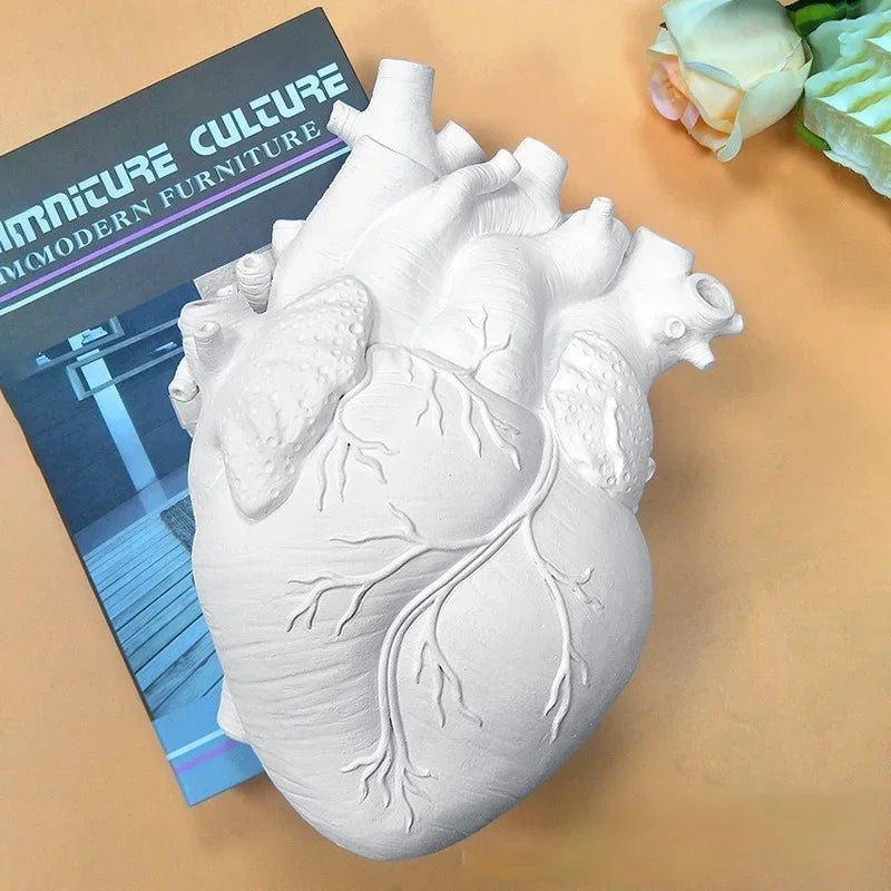 Resin heart sculpture decor for tabletop.