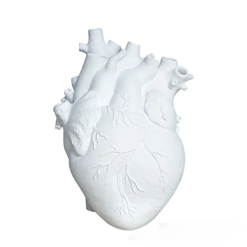 White resin heart resin flower pot.