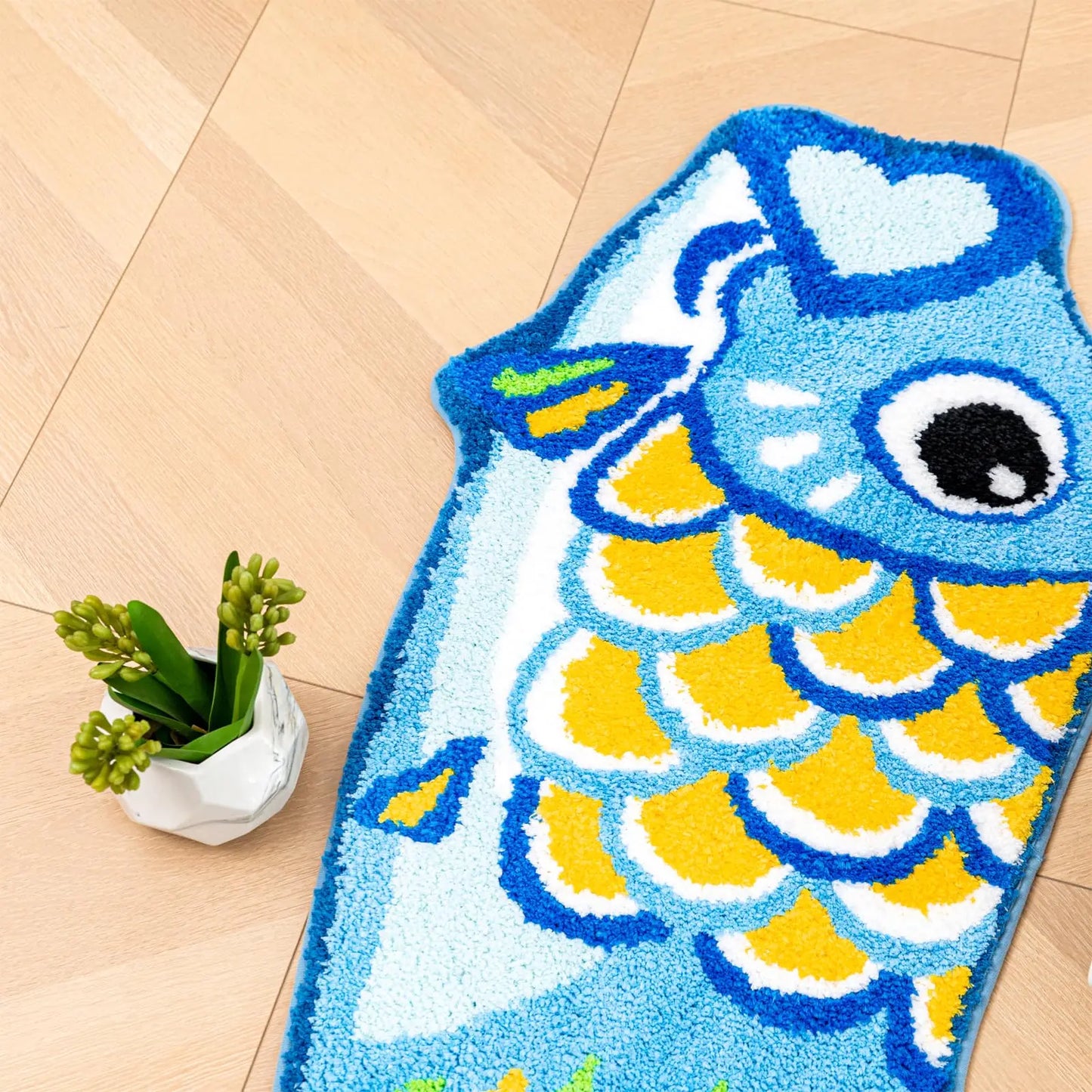 Blue koi bathroom mat with anti-slip backing