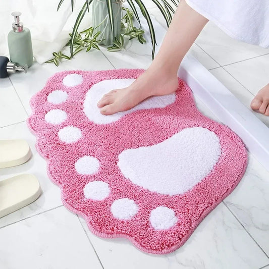 Luxury pink microfiber bathroom rug with absorbent non-slip base.