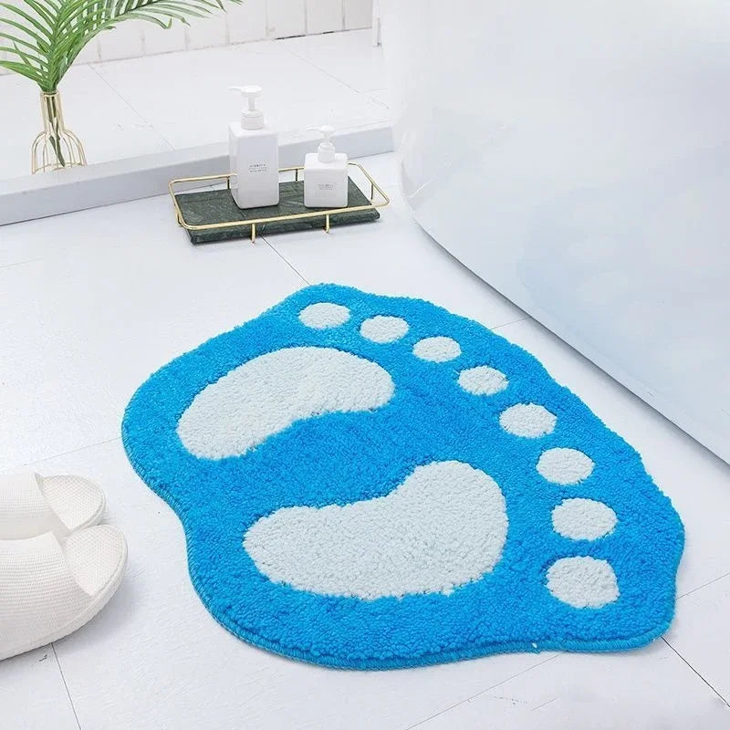 Blue microfiber bathroom floor mat with anti-slip bottom.