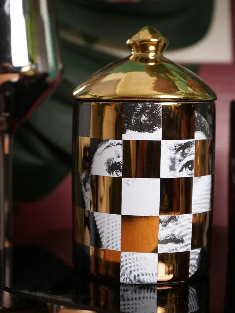 Premium face motif candle jar for home styling.