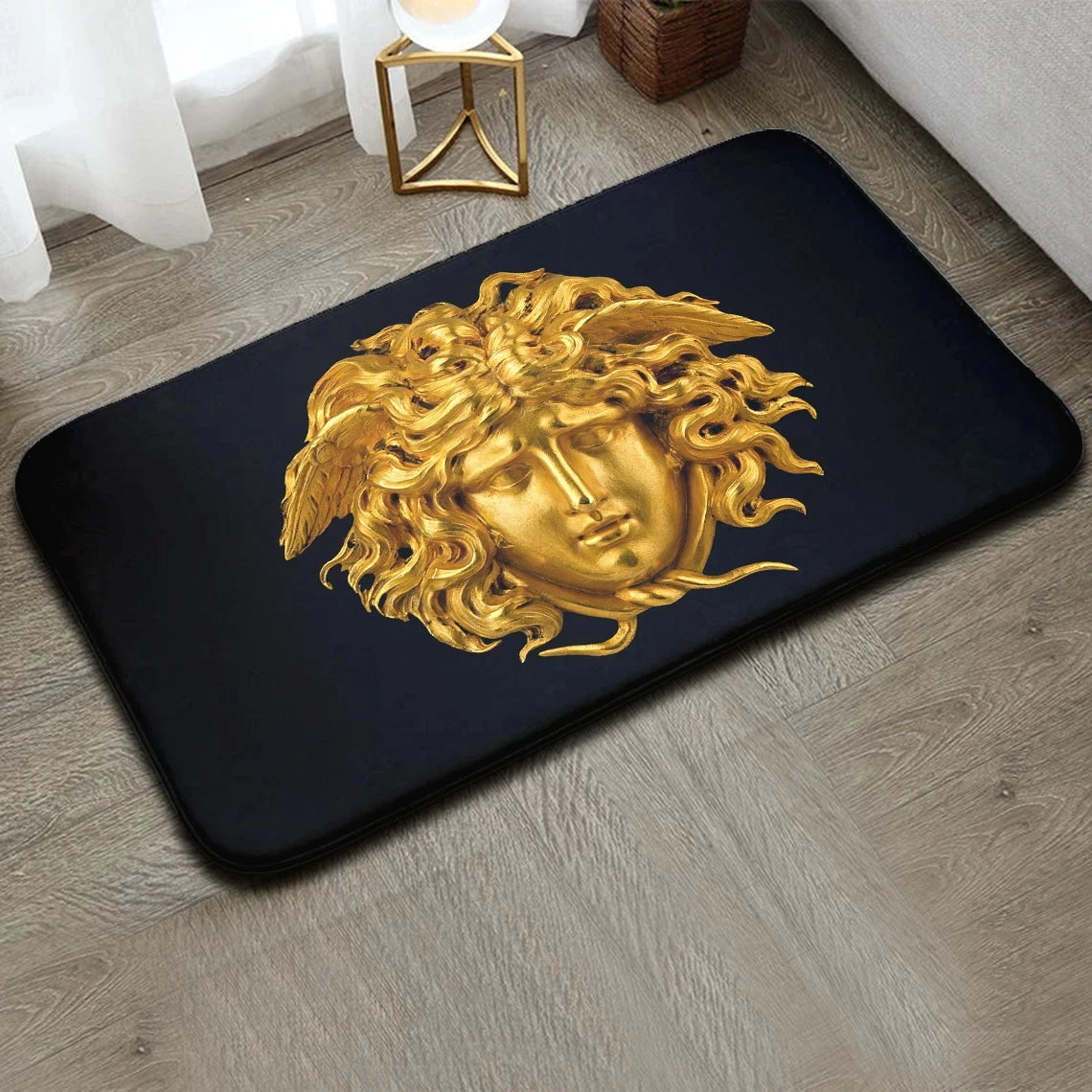 Anti-slip bathroom rug featuring golden Medusa face design.