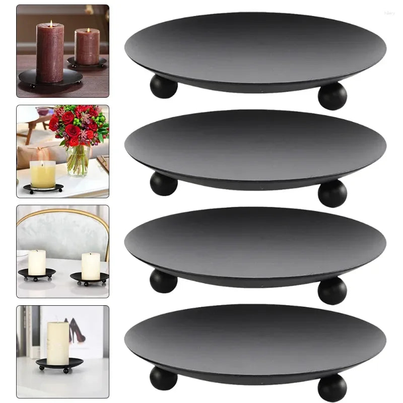 Gold metal candle holder with iron plate base for home décor.