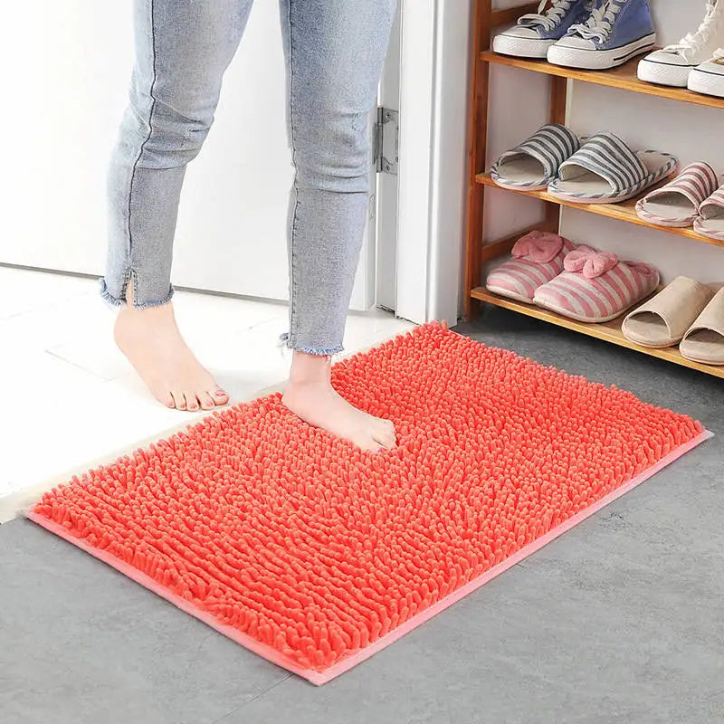 Luxury thick memory foam bath mat in orangered color for bathrooms.
