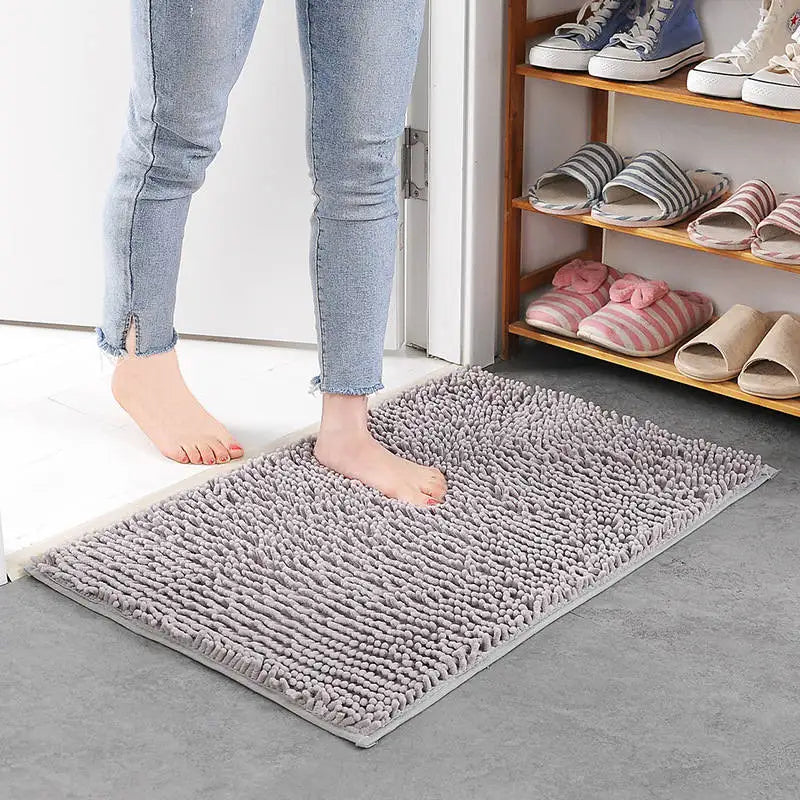 Silver grey luxury bathroom mat with anti-slip design.