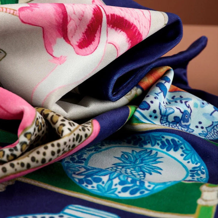 Classic chinoiserie pillow cover with botanical and fauna prints.