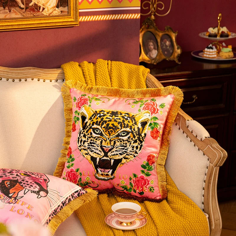 Luxury animal print throw pillowcase with tassel trim.