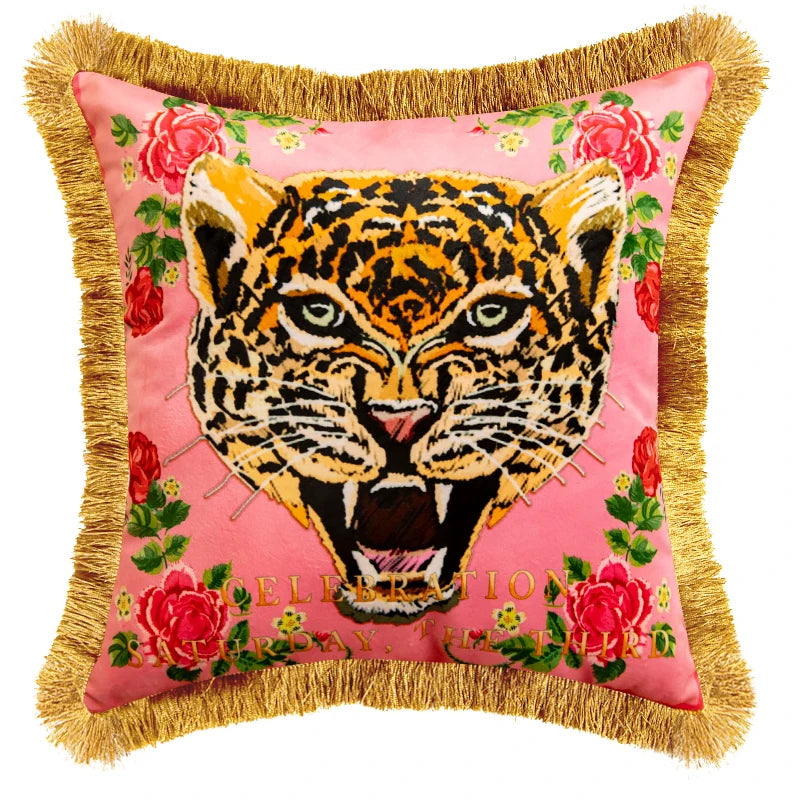 Yellow leopard velvet pillow cover with elegant gold fringe.