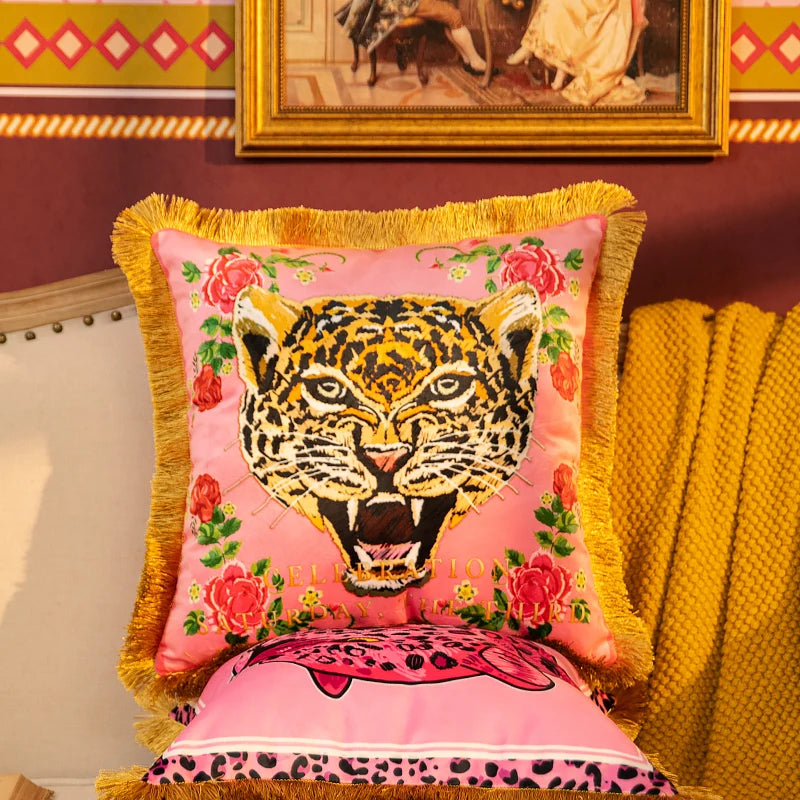 Luxury leopard print cushion with golden tassel border.