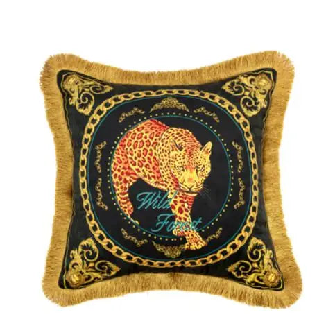 Luxury velvet cushion cover with gold leopard design and tassel border.
