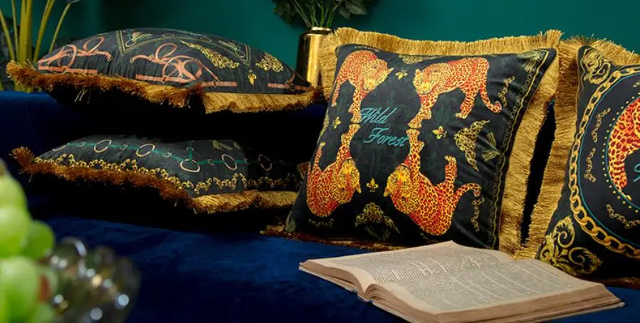 Ornate velvet cushion cover with royal lion artwork.