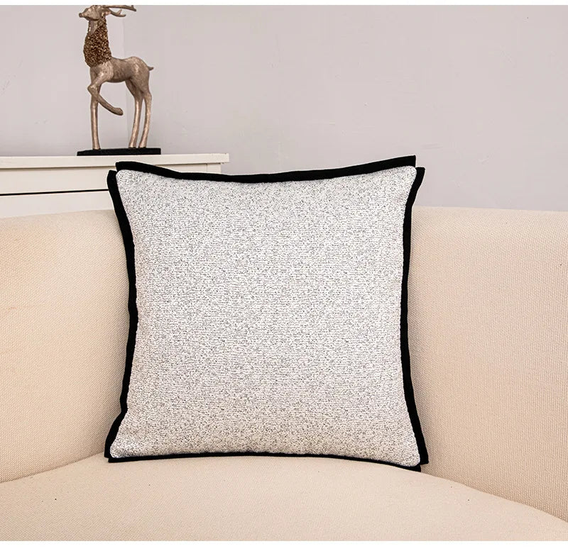 Artistic linework cushion cover in black and white design.