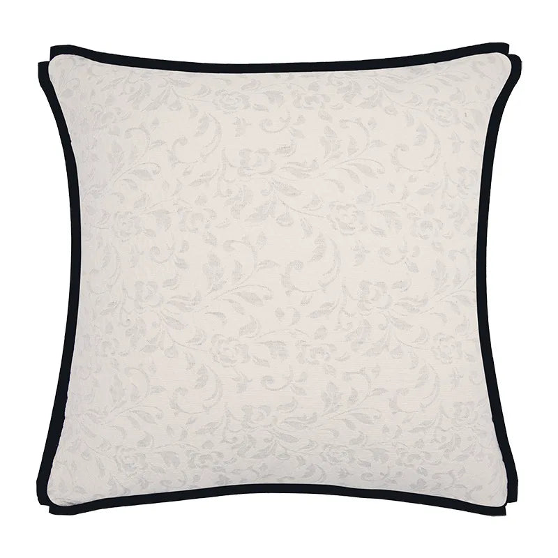 Black and white embroidered cushion cover with luxury design.