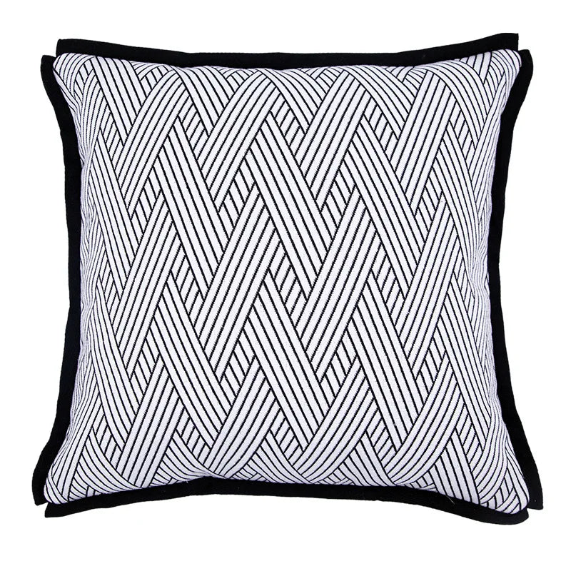 Elegant black and white cushion cover for living room accents.