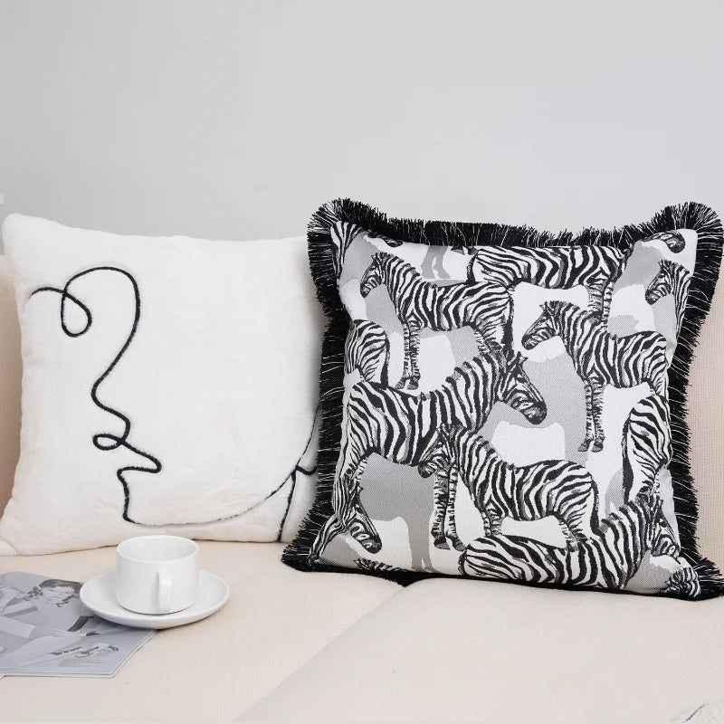 Square cotton blend cushion cover with animal print design.