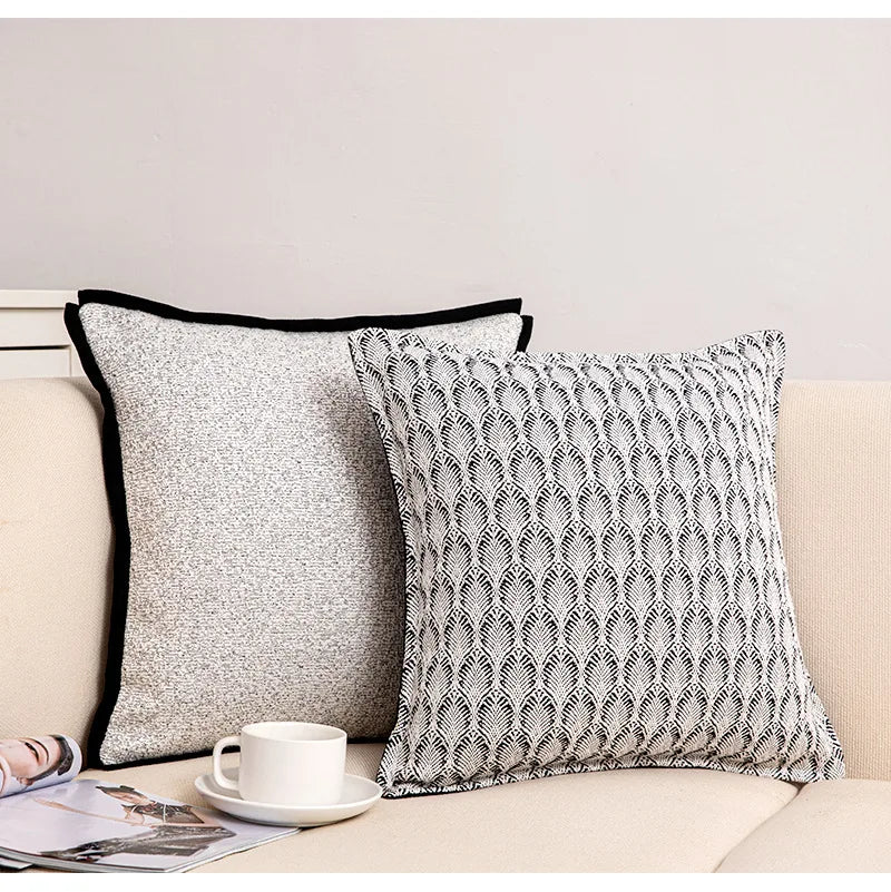 Modern black and white sofa cushion cover with zebra print.