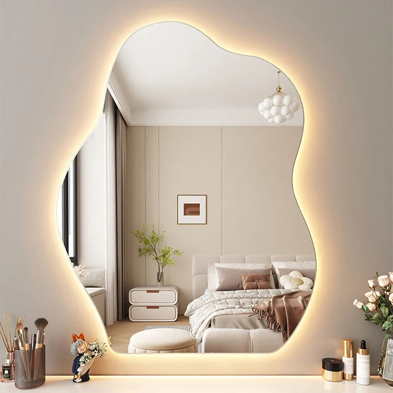 Modern wavy wall mirror with LED light for bedroom vanity décor.