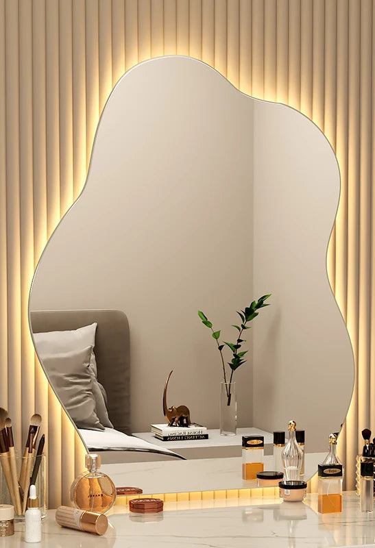 Fashion-forward wavy wall mirror for makeup vanity.