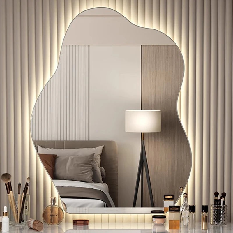 Contemporary wavy mirror with white light illumination.