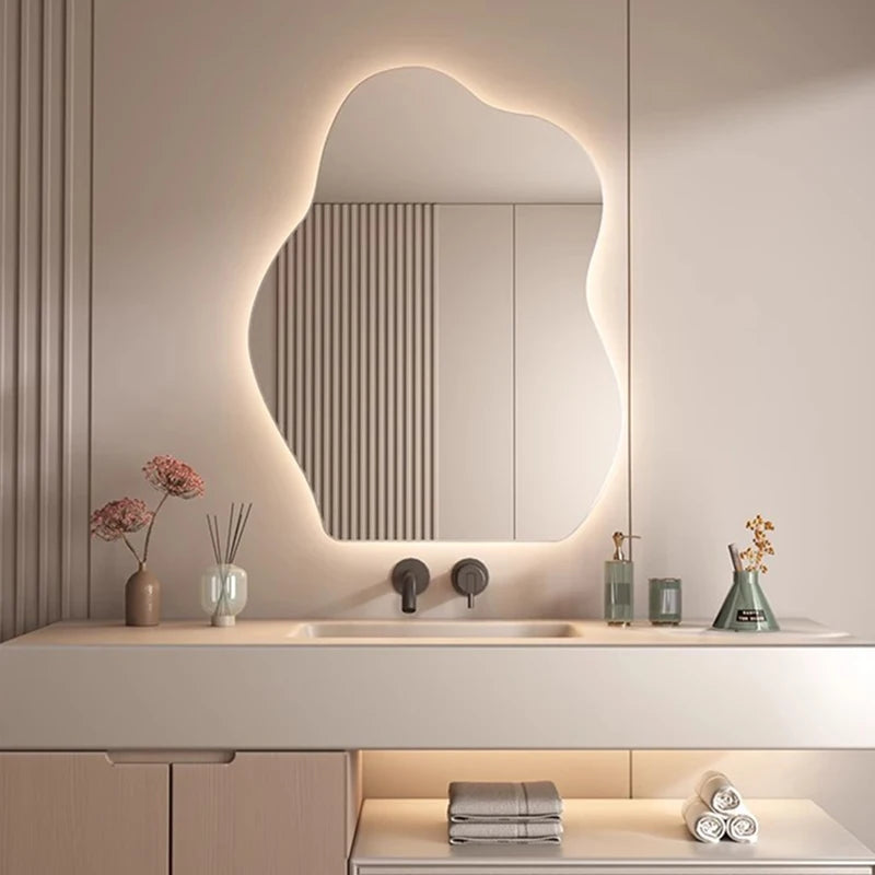 LED wave design mirror above vanity table in bedroom.
