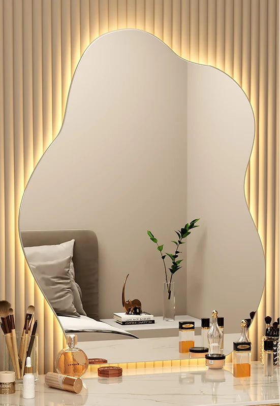 Artistic wavy mirror with warm white backlight.