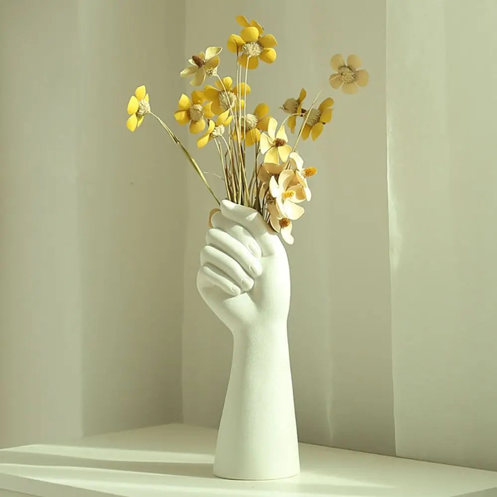 Unique hand arm vase centerpiece for modern home décor.