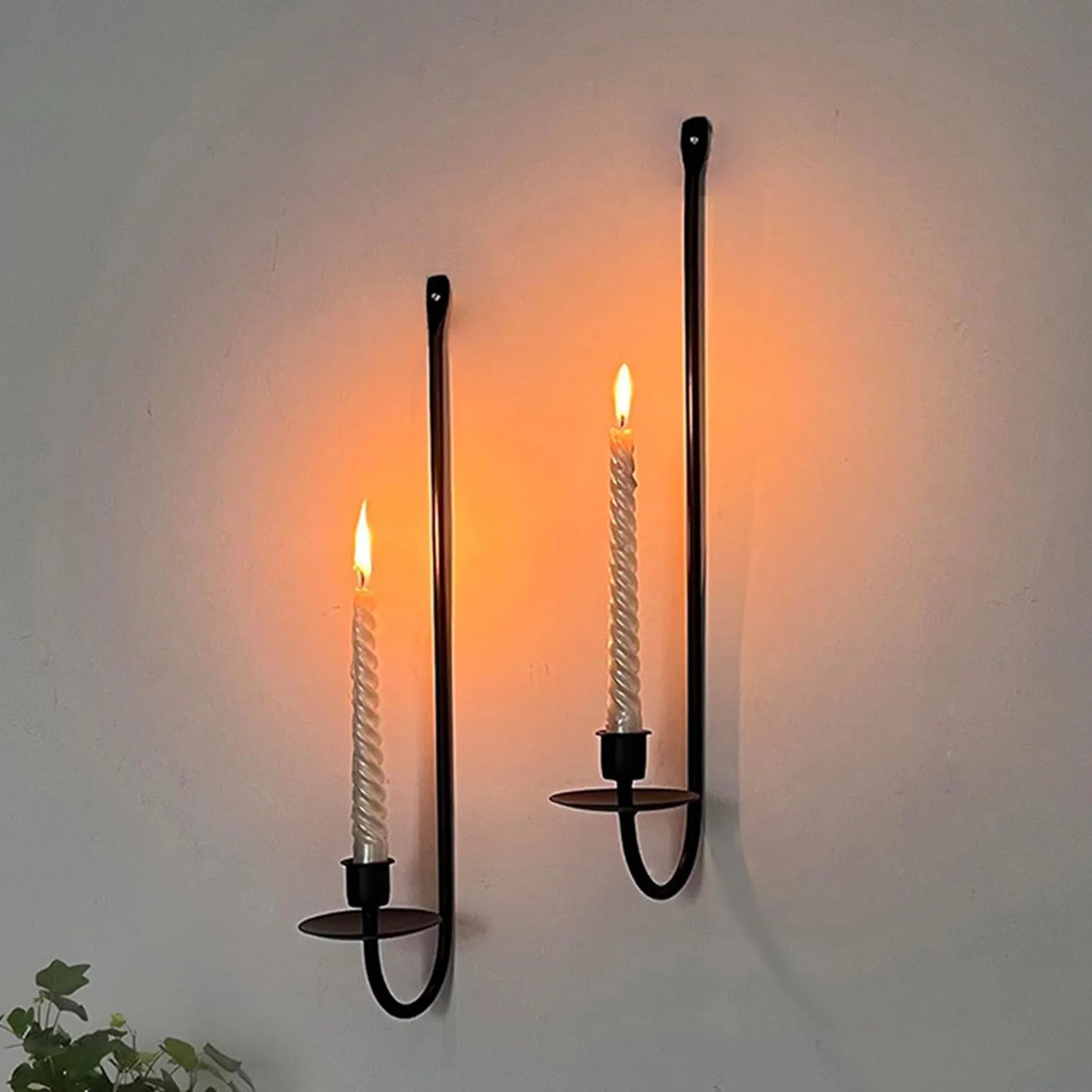 Minimal wall candle stand for contemporary interior design.