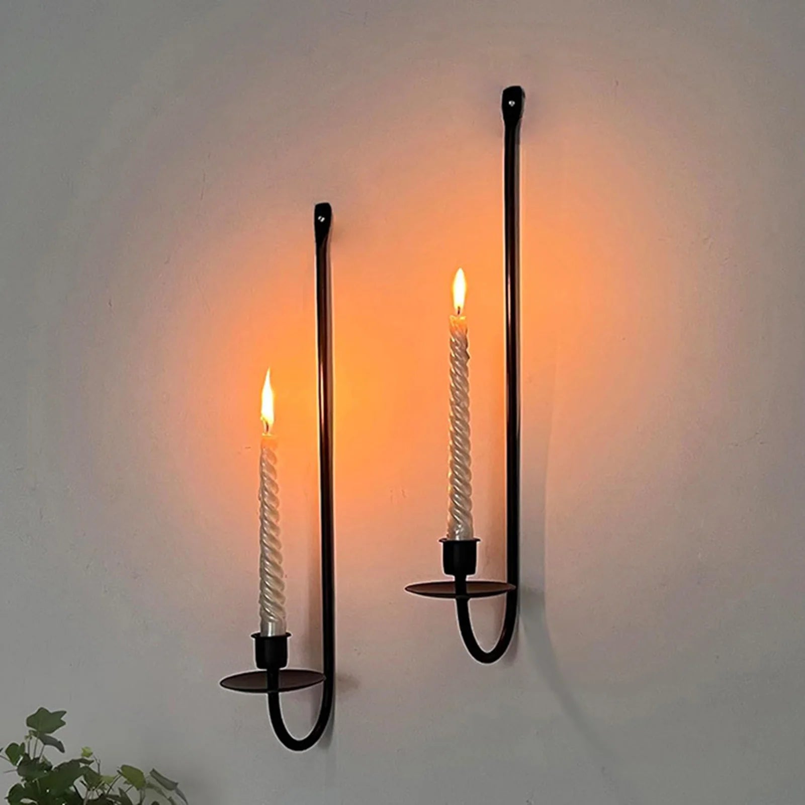 Minimal wall candle stand for contemporary interior design.