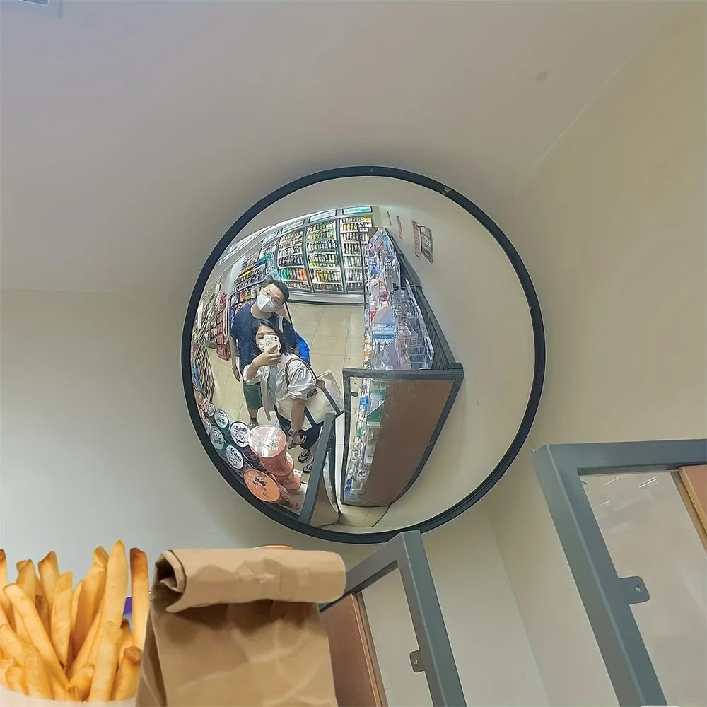 Wall-mounted white mirror for compact spaces and décor.