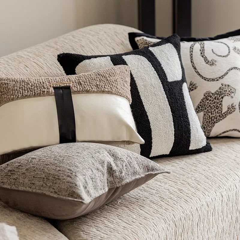 Rectangular and square pillow covers with patchwork design.