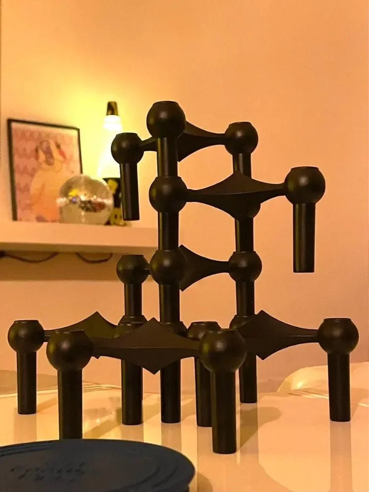 Black stainless steel candle holder for home lighting.
