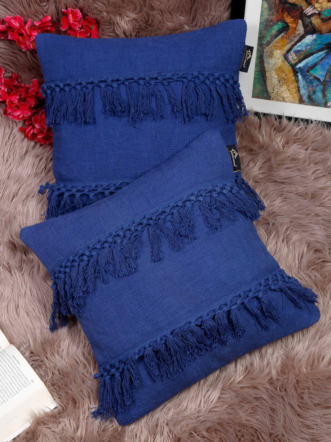 Handcrafted navy blue pillow covers for modern living room decor.