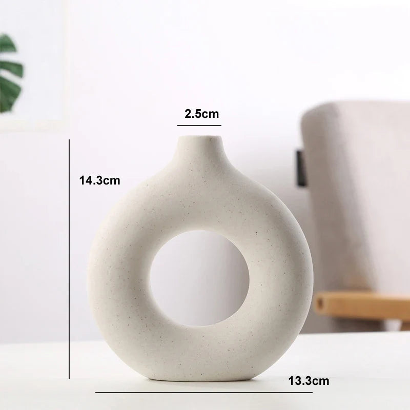 Modern donut vase for flowers, plants, and decor.