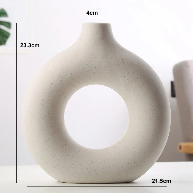 Nordic style ceramic donut vase for gifting and decor.