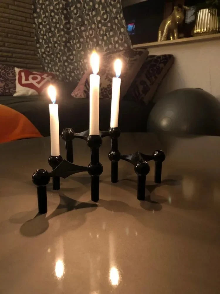 Artistic modular candle stand for modern dining table decoration.