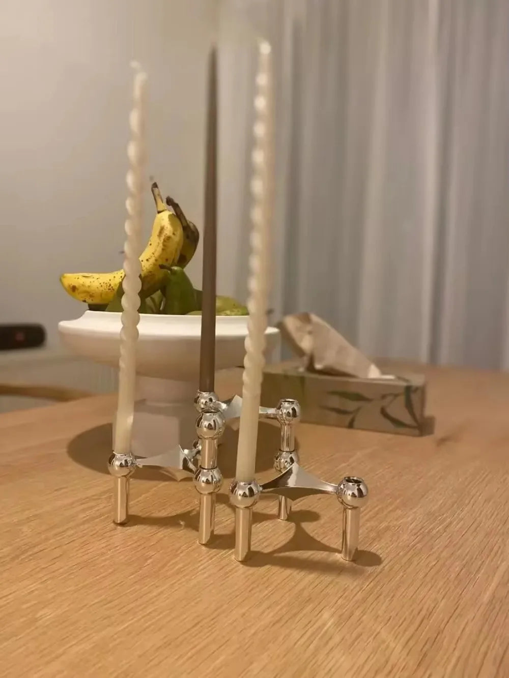 Silver molecular candle holder set for bedroom decor.