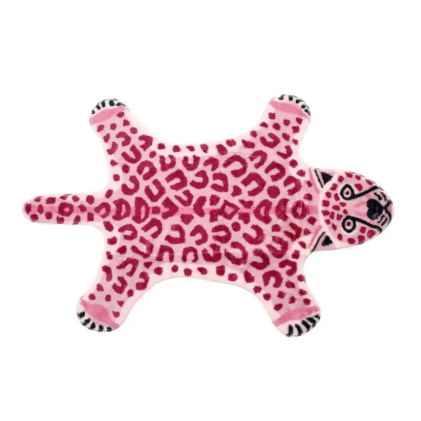 Washable faux leopard skin rug with anti-slip base.