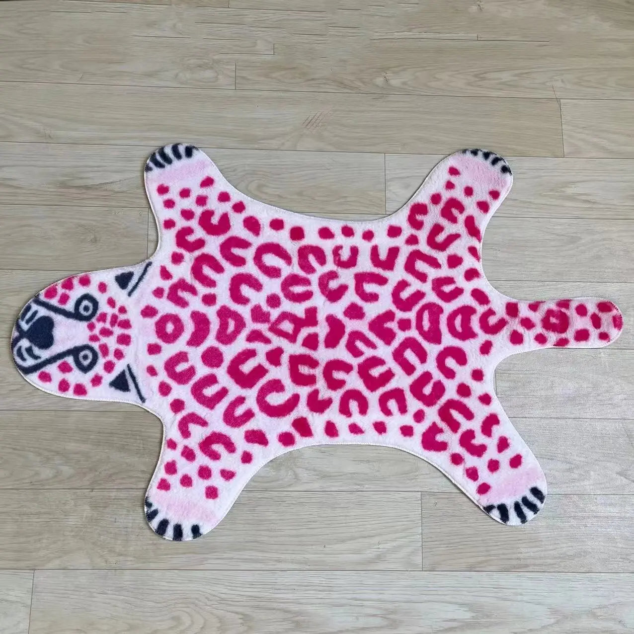 Bold pink faux skin carpet for stylish home interiors.