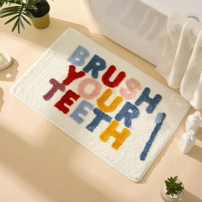 Brush Your Teeth tufted microfiber mat for kids’ bathroom.