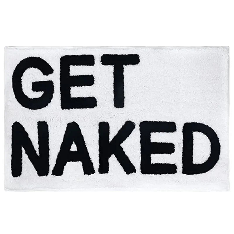 Black and white modern bath rug with Get Naked lettering.