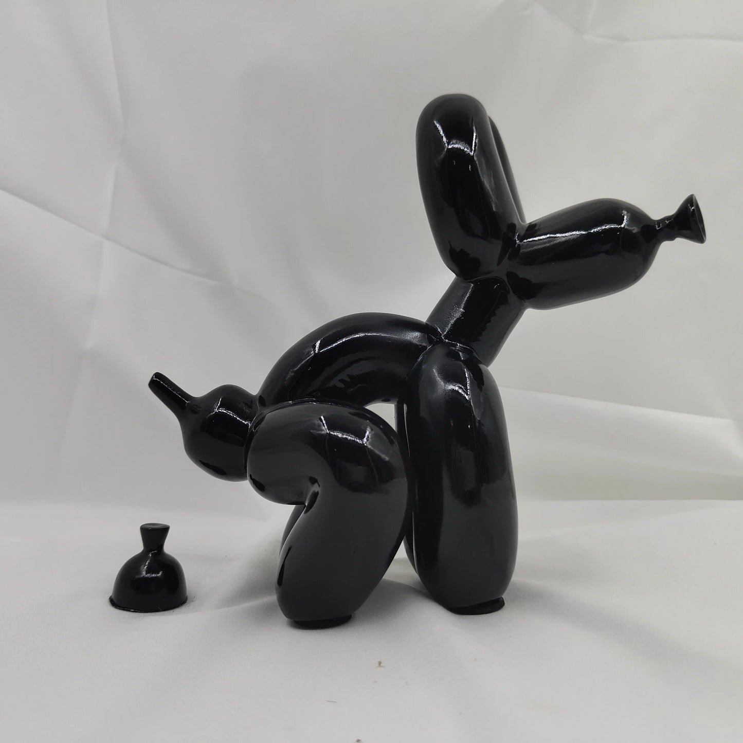 Modern novelty dog figurine for home decoration and gifting.