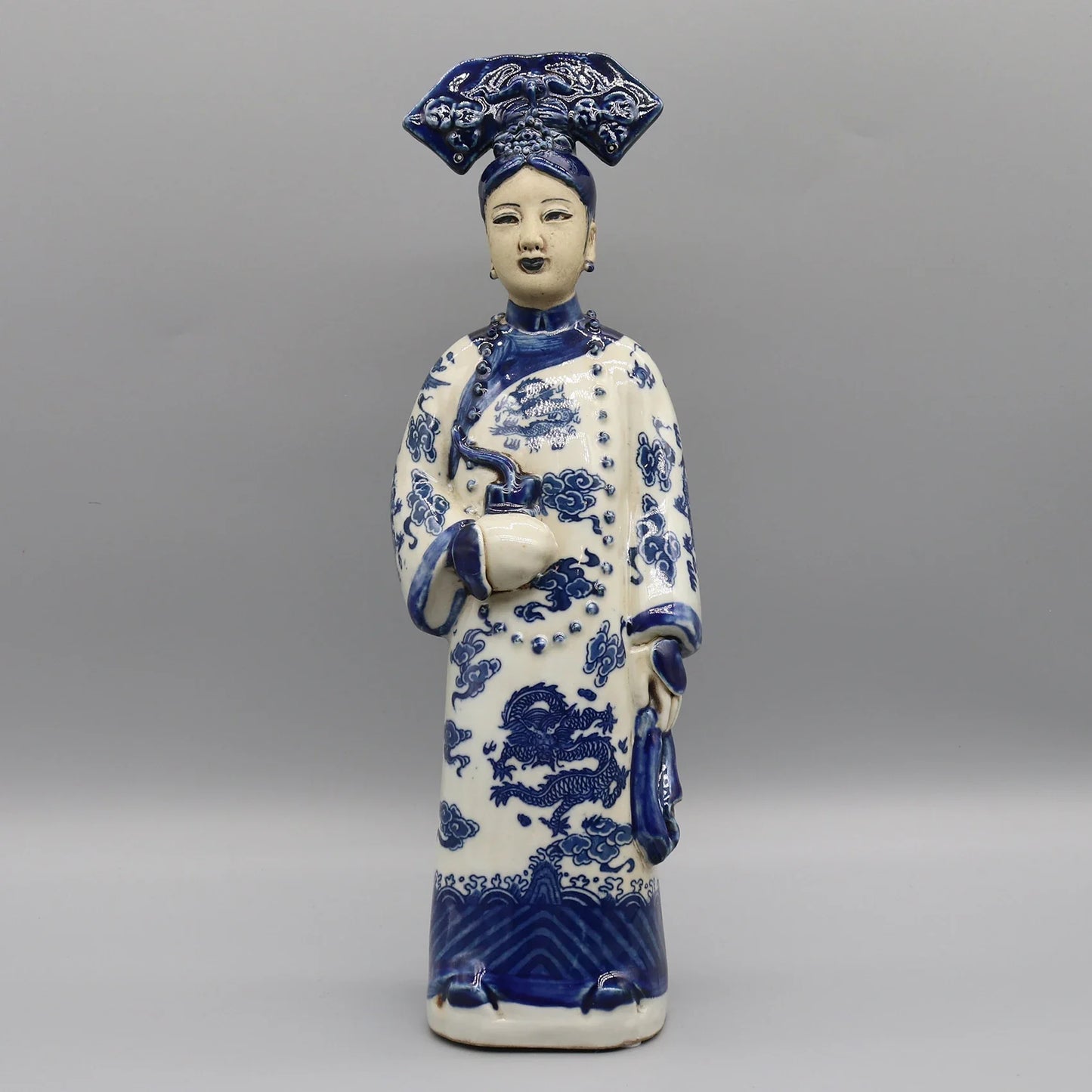 Porcelain figurine of royal Chinese empress statue.