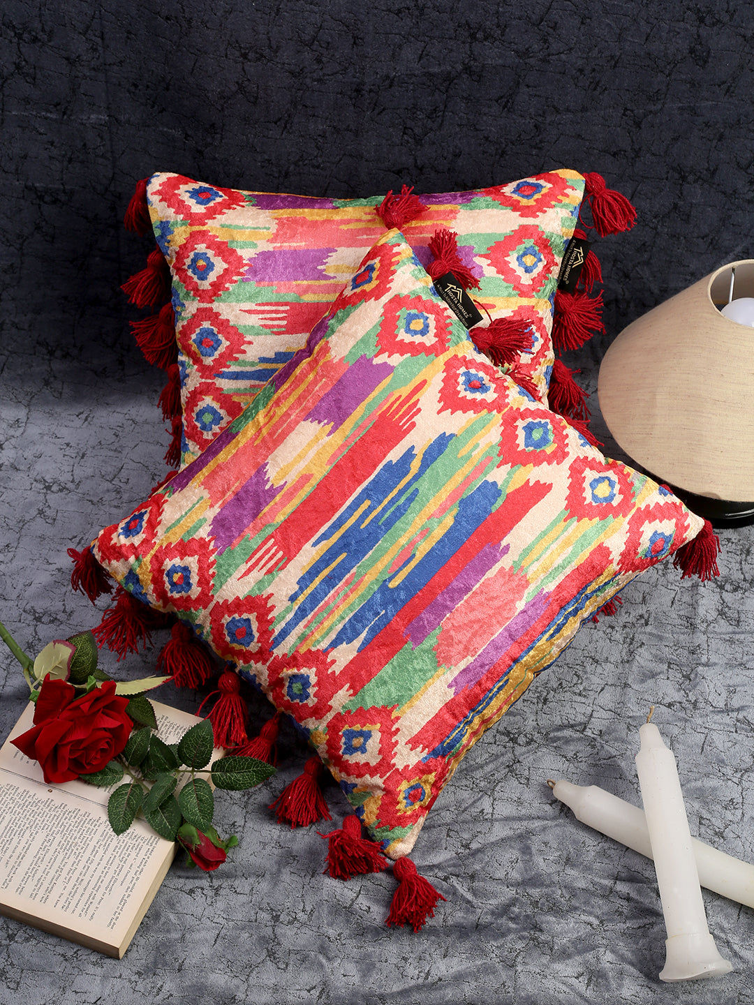 Luxury velvet pillow covers for living room décor in red and cream pattern.