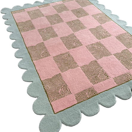 Luxury New Zealand wool rug with scalloped border and checker pattern.