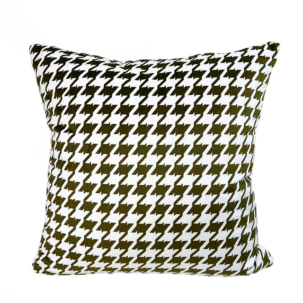 Exotic jungle-inspired velvet cushion cover in olive tones.