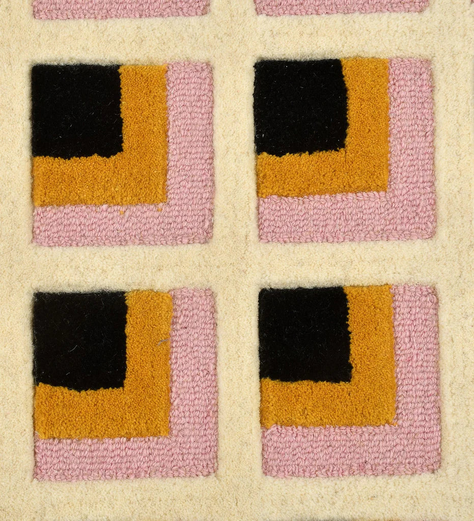 Luxury wool rug with artistic geometric pink and mustard design