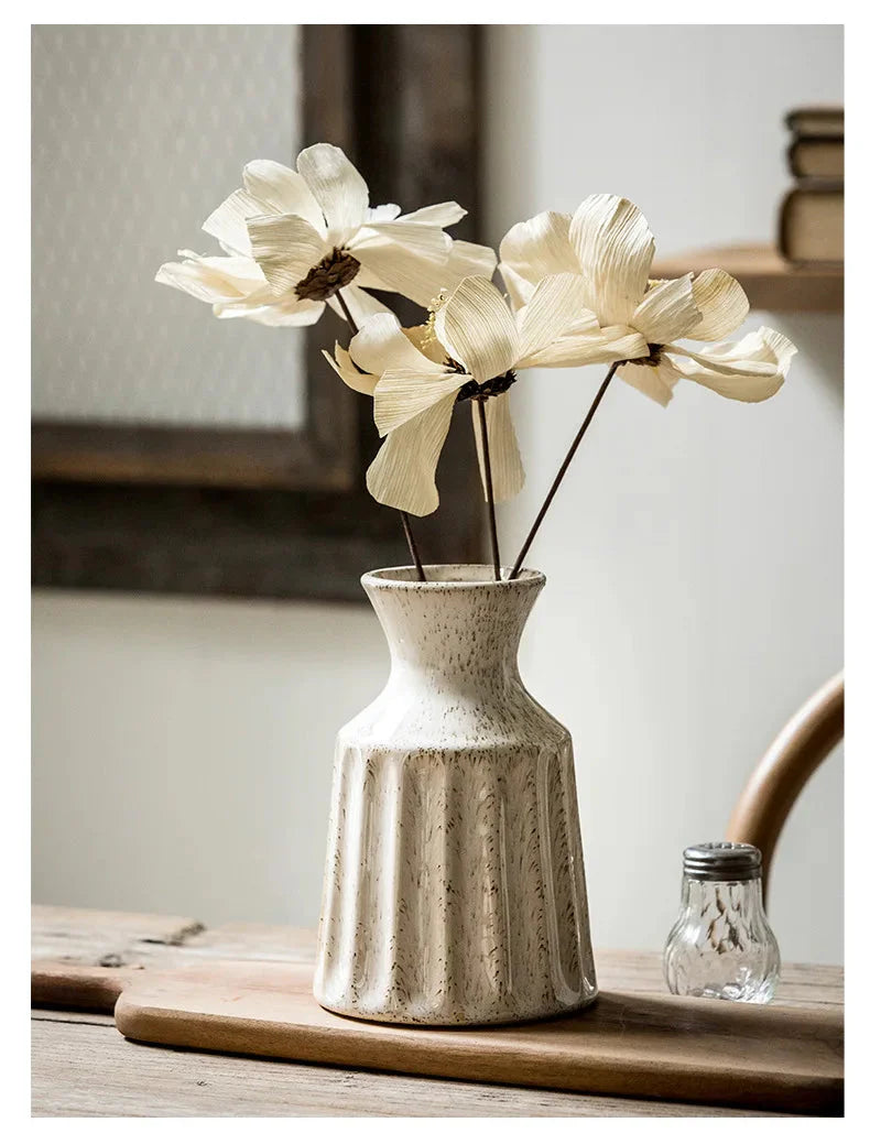 Compact ceramic fluted vase for bedroom or living room styling.
